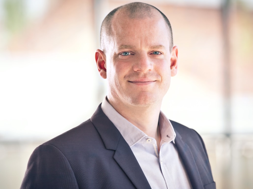 Picutre of Tobias, the Director of Business Unit Personalization Services.